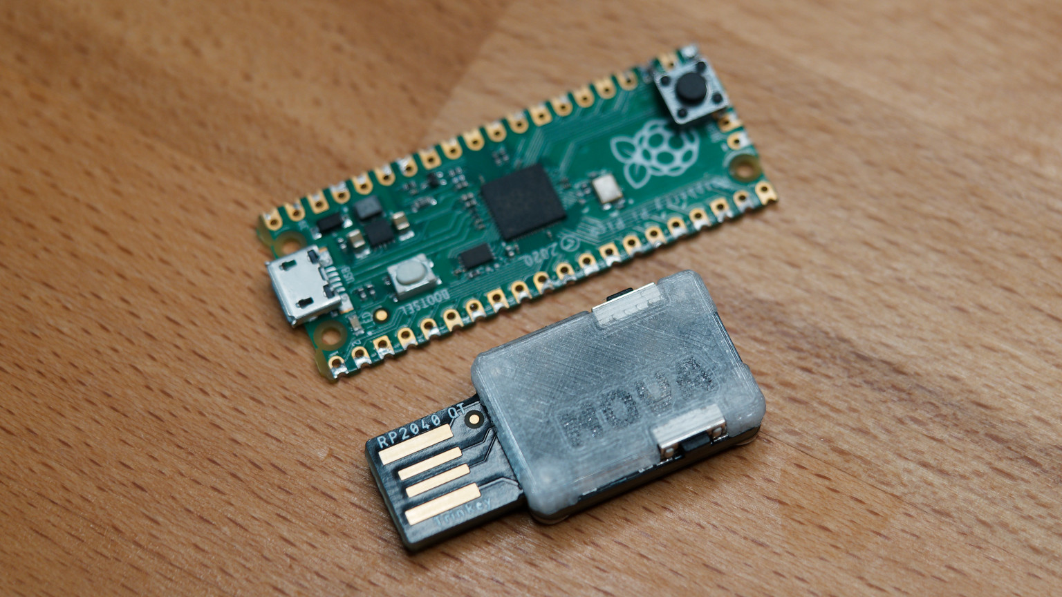 Raspberry Pi Pico and Adafruit Trinkey, modified to run USB Nova